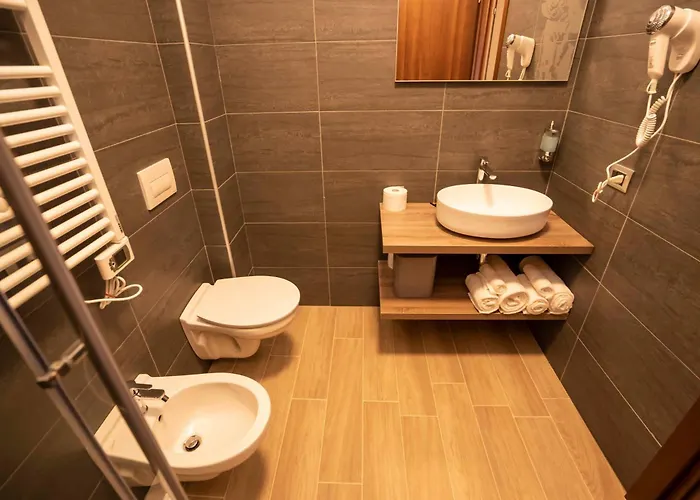 ホテル Binario Magic Ristohotel 3*